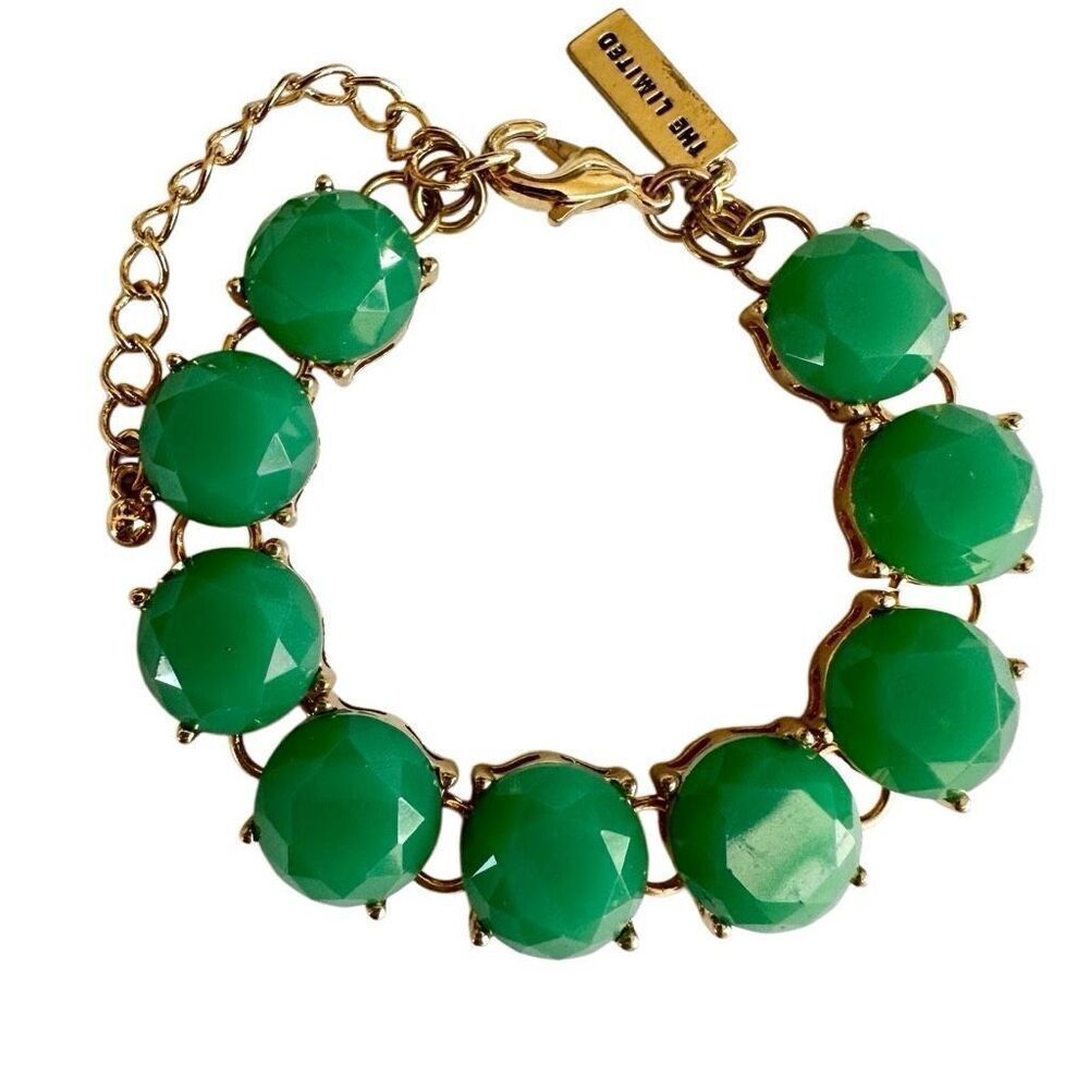 The Limited gold tone and green bracelet